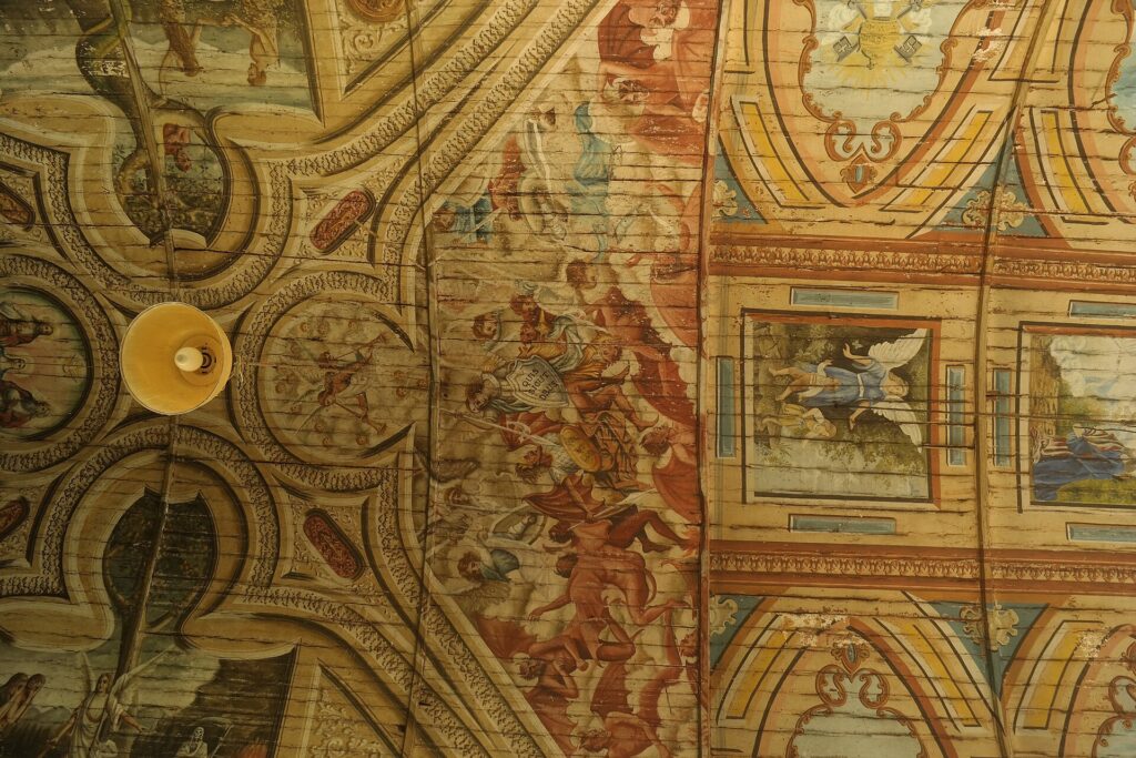 Close-up of the 19th-century ceiling paintings in Argao Church