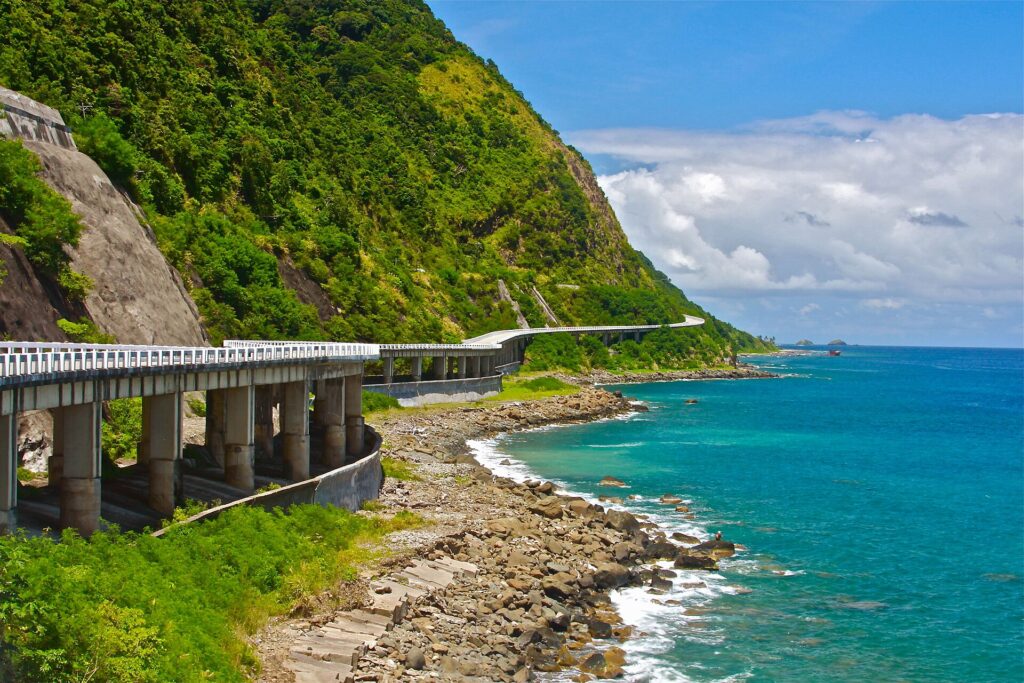 The Patapat Viaduct hugging the cliffs above the sea in Pagudpud