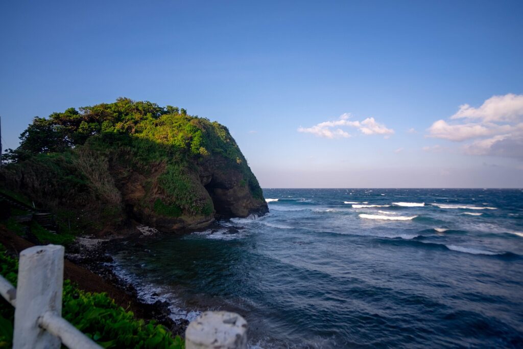 Bantay Abot, the hill with a sea arch at Pagudpud's coast