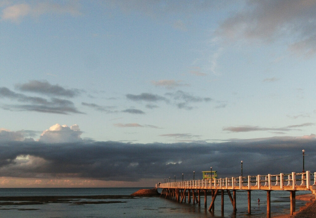 The Bontay Walk boardwalk at dawn near Kota Park