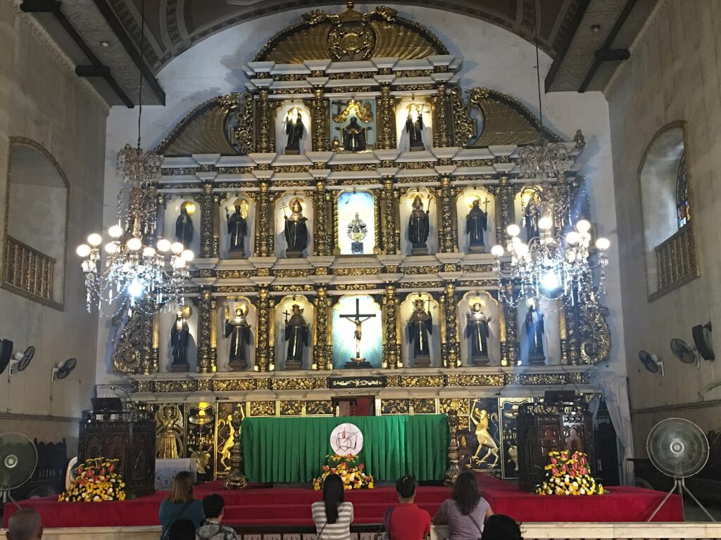The gilded altarpiece inside the basilica