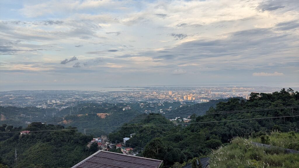 Forested hills rolling down to Cebu City, seen from Temple of Leah