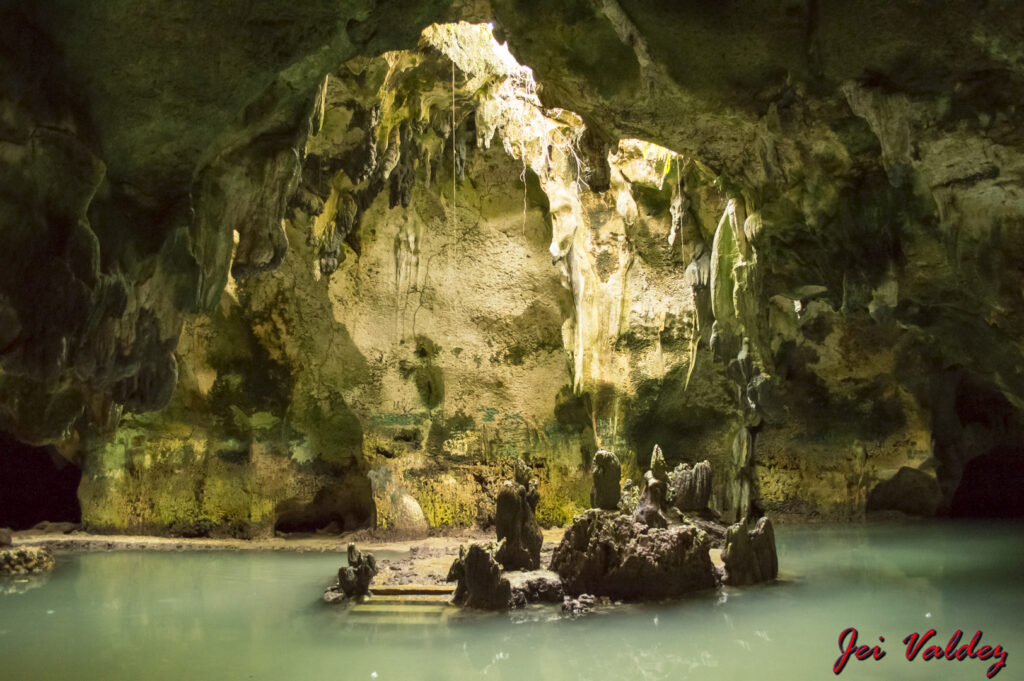 The green pool and rock pillars of Bukilat Cave, Tudela