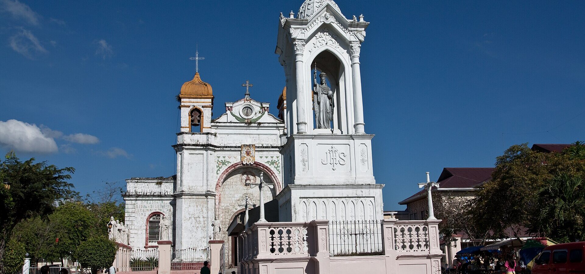 St. Catherine of Alexandria Church in Carcar with its monument under a blue sky