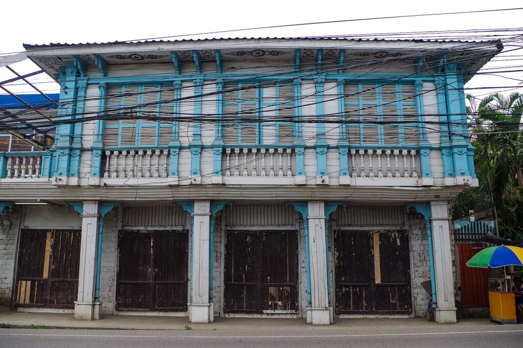 Blue and white wooden facade of the Yap-Rodriguez House