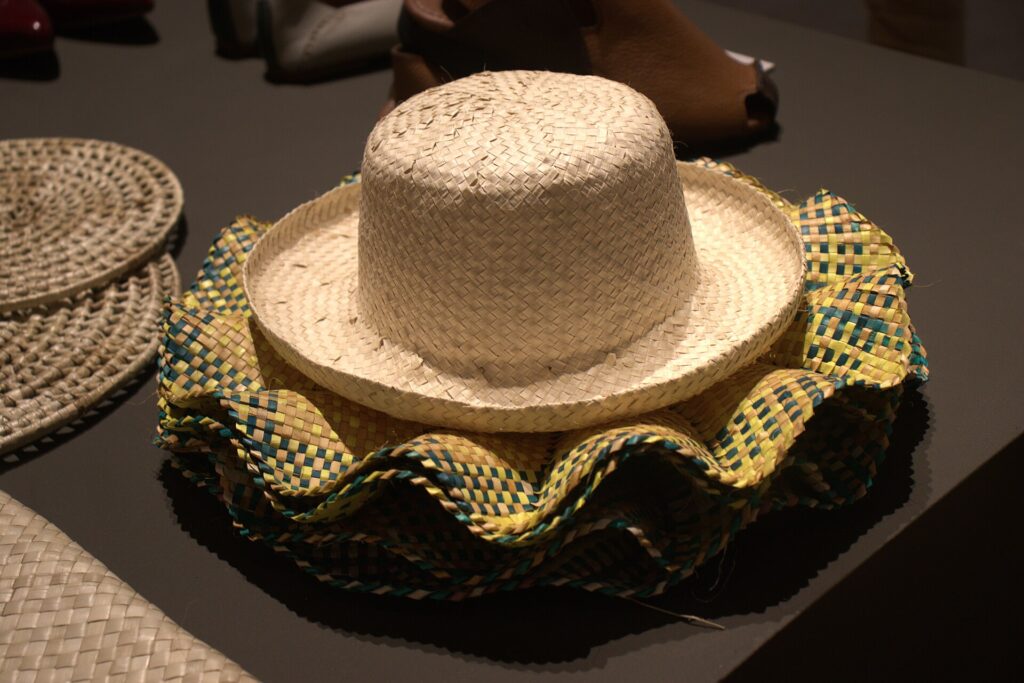 A woven straw hat in a crafts exhibit