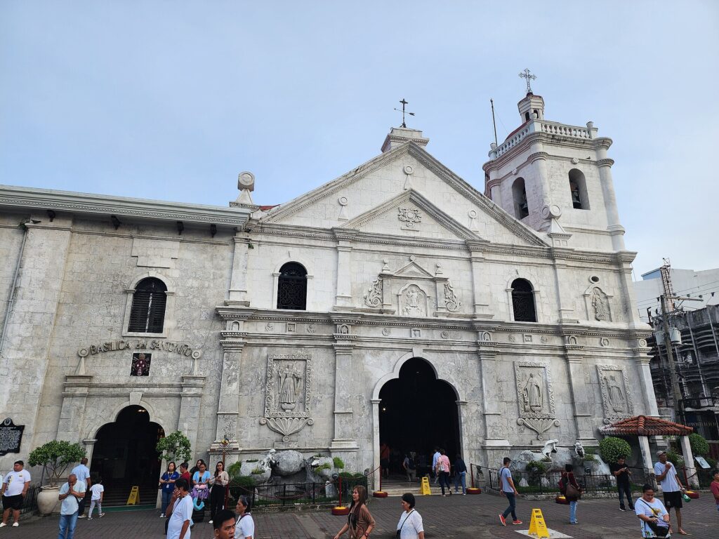 The stone facade of the Basilica Minore del Santo Niño