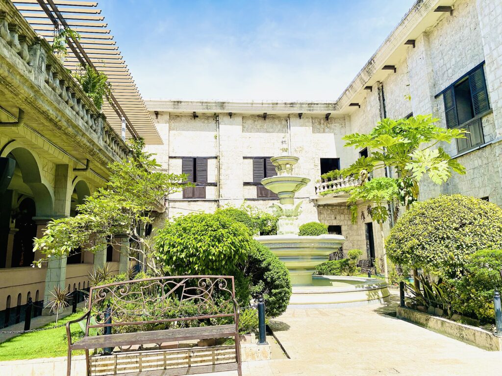 A quiet garden courtyard inside the Santo Niño convent