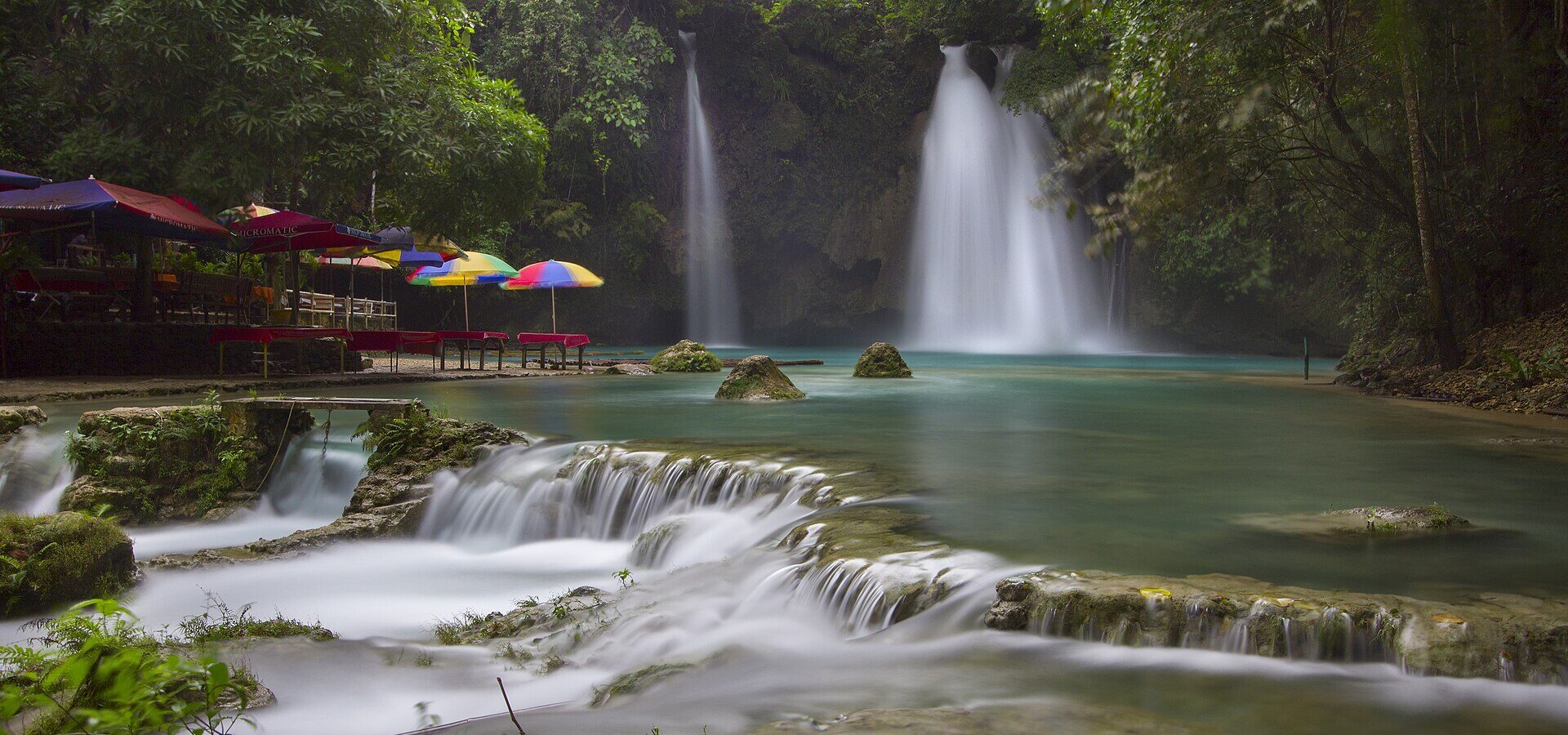 Turquoise pools of Kawasan Falls in Badian, Cebu, a typical waterfall day where water shoes and a dry bag help