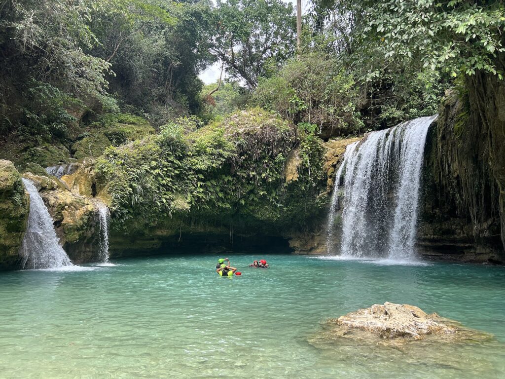Swimmers in the turquoise pool at the second level (2026)