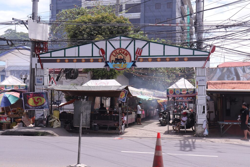 The Liloan food street arch and stalls