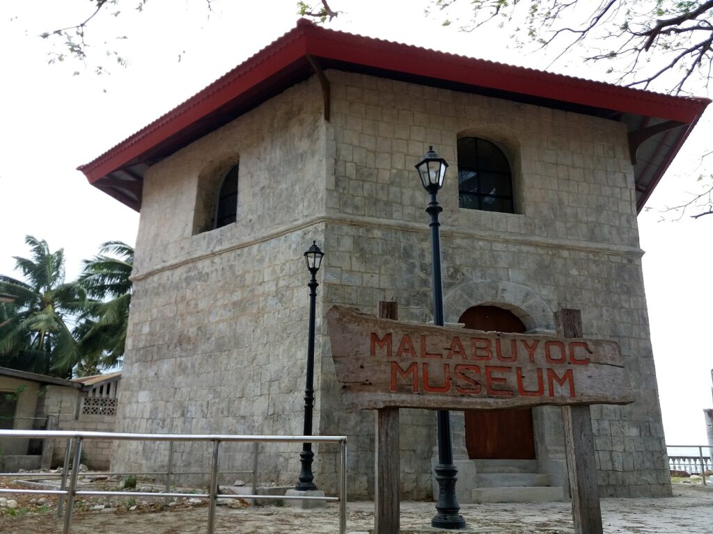The old stone watchtower of Malabuyoc, used as the town museum