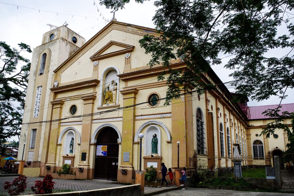 The side of Barili Church on a sunny day