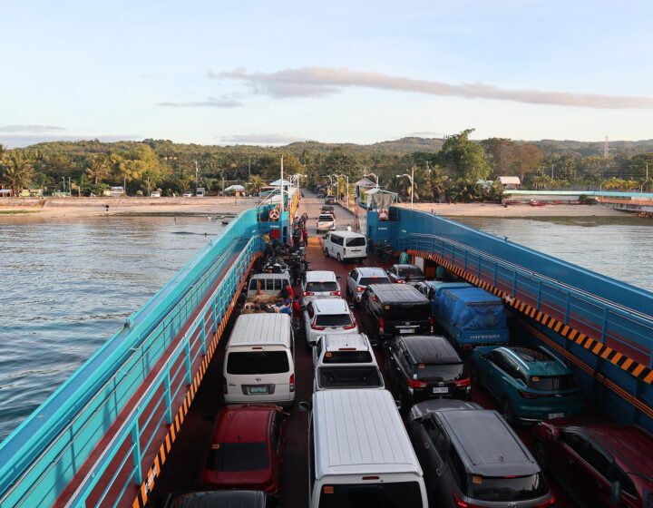 A RoRo ferry full of vans and cars arriving at Liloan port in Santander, South Cebu