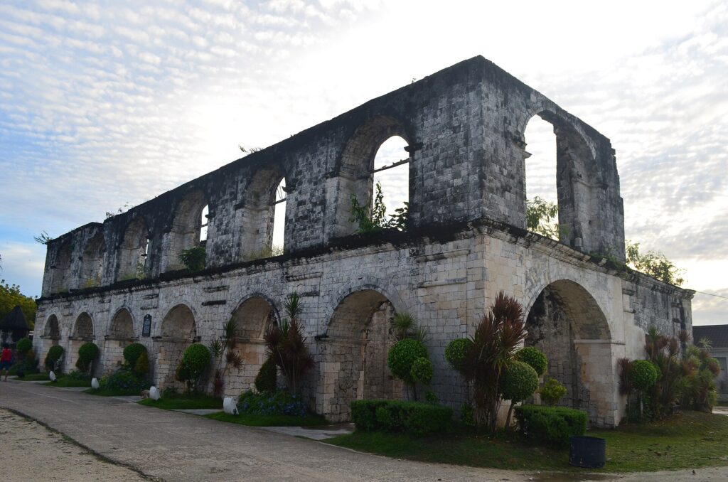 The roofless coral-stone Cuartel in Oslob Heritage Park
