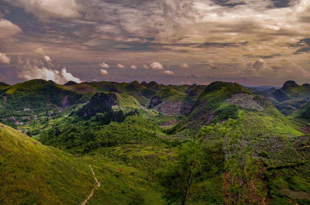 Golden morning light on the karst hills around the peak