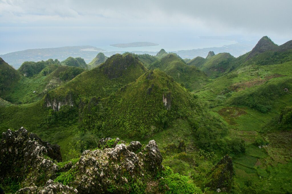 Looking out over the karst hills to the distant coastline