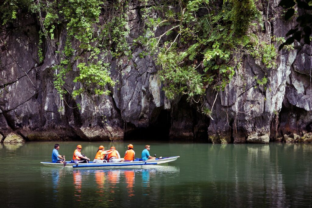 A paddle boat heads into the mouth of the Puerto Princesa Underground River