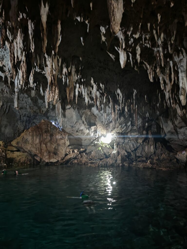 Swimming in the underground lagoon of Hinagdanan Cave, Dauis