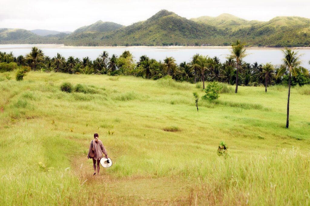 Grassy slopes of Corregidor (Casolian) Island, an island-hopping stop