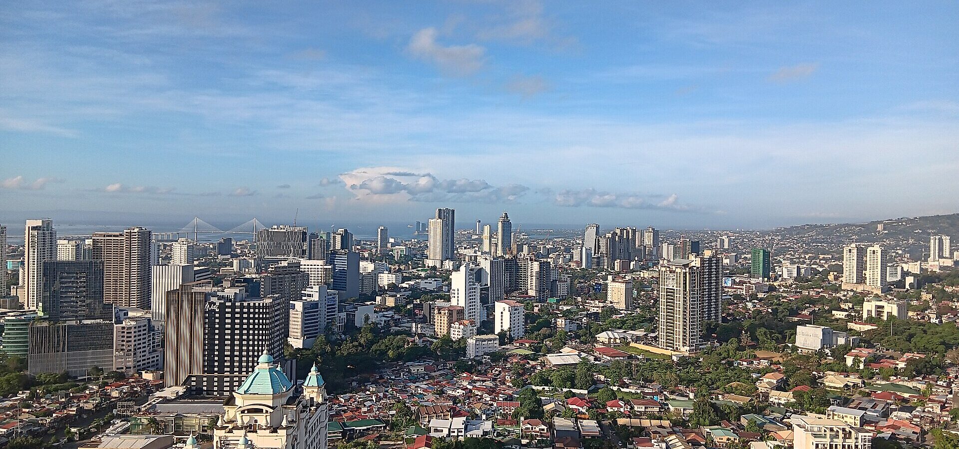 Cebu City skyline on a clear day, taken from a high-rise in the city