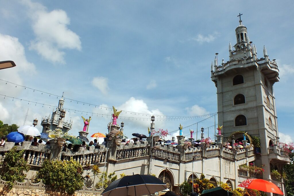 Towers and angel statues on the shrine's lower plateau