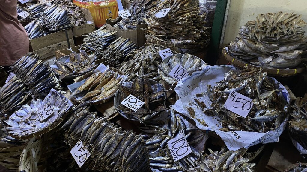 Baskets of dried fish with price tags at Toledo Public Market in Cebu
