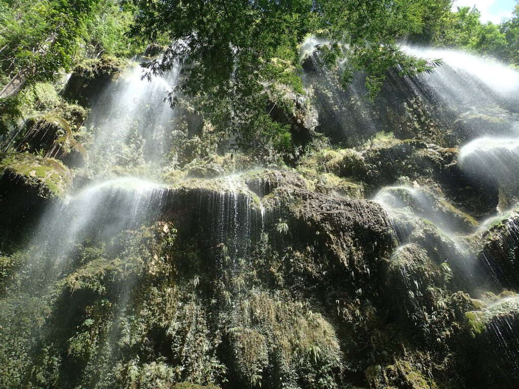 Sunlight on the thin falling streams of Tumalog Falls