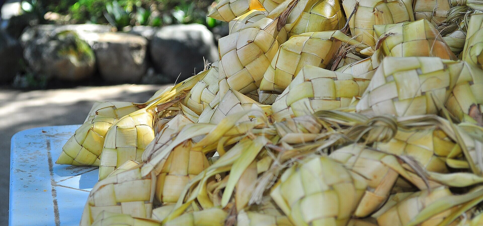 A pile of puso, rice cooked in woven coconut-leaf pouches, in Cebu